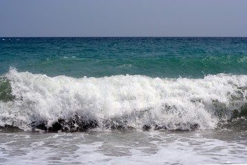 wave crashing on the shore