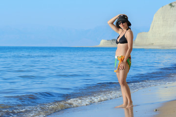 attractive young woman at a beach