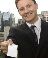 handing you a business card - 1209945