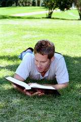 Naklejka na ściany i meble reading in grass