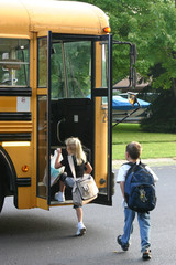 kids getting on bus © sonya etchison