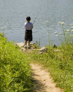 young child fishing