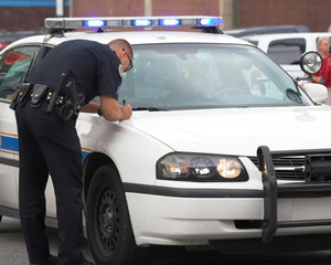 policeman making report