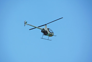 Fototapeta na wymiar robinson r-22 helicopter