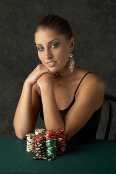 young woman with poker chips