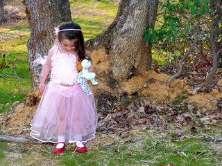 princess girl looking at dorothy shoes