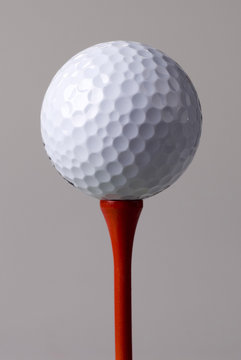 golf ball on red tee