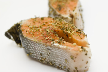 salmon in herbs marinade prepared for cooking