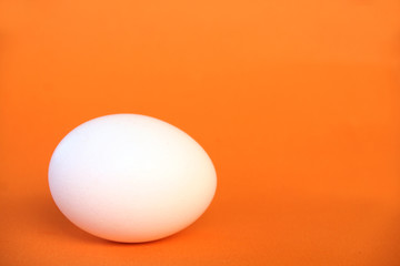 egg on orange surface 2