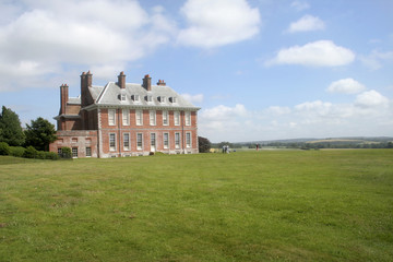 english country mansion and sky