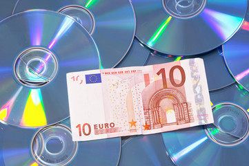 compact disk and money