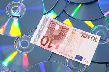 compact disk and money