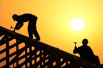two roofer silhouette - obrazy, fototapety, plakaty
