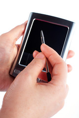 business woman writing on a pda organizer