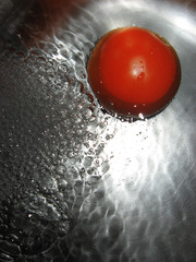 fresh tomato in water