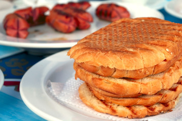 crisp hot toasts and grilled sausages
