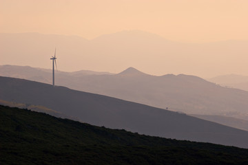 wind turbine on hill