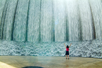 happy woman at fountain