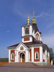 Fototapeta na wymiar Orthodox church with golden domes and crosses