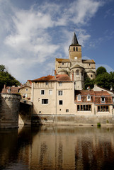 Fototapeta na wymiar historic buildings on a tranquil river