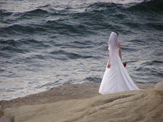 bride on the edge  of ocean
