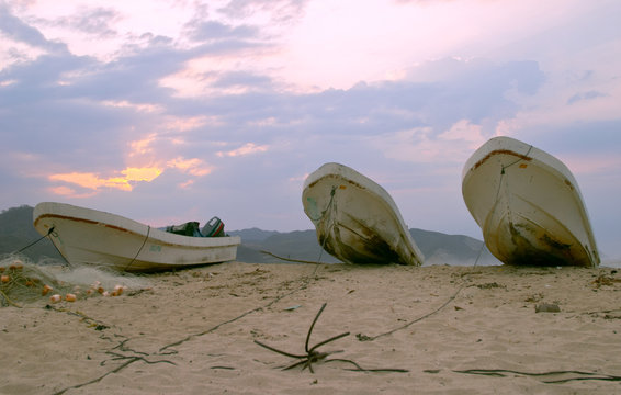 fishing boats at dawn