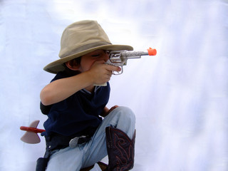 boy playing cowboy