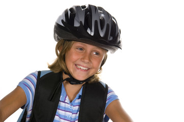 girl riding bike to school