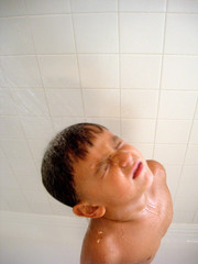 boy taking shower