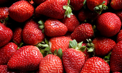 a pile of strawberries