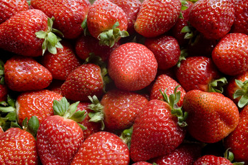 a pile of strawberries