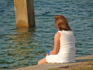 young girl fishing