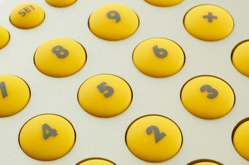 Fototapeta premium yellow buttons of calculator