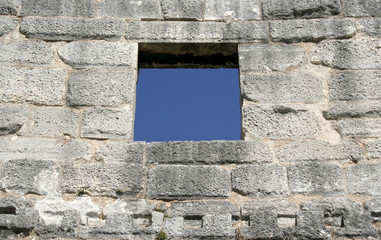 window in a old stone wall