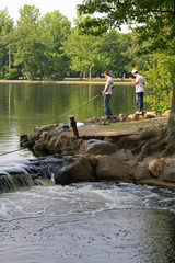 boys fishing on the lake