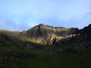 Fototapeta na wymiar sunny patch on a dark mountain