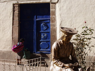 decorated blue door w/sculpture, native girl