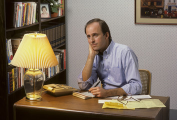 man works in home office