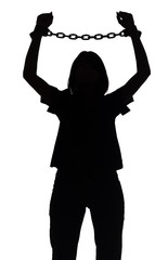 silhouette of woman with chains