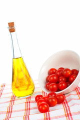 olive oil bottle and tomatos cherry