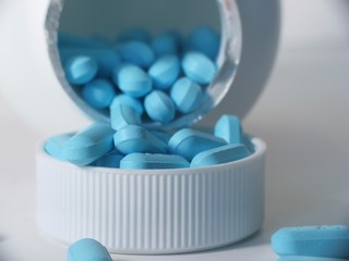 cap full of blue pills