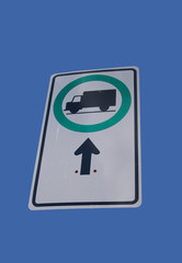 trucks this way sign