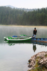 Fototapeta na wymiar girl on boat dock