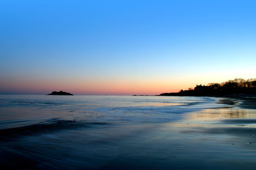 Fototapeta na wymiar singing beach sunset