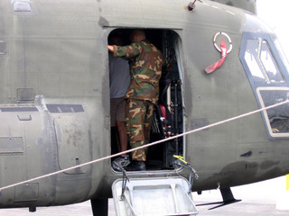 entering a chinook helicopter
