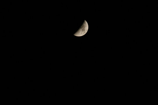 half-moon in black sky