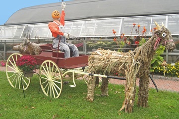 pumkin head rides a wagon