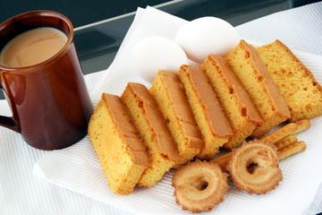 rusk cake & biscuit & tea with milk mug