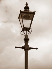 old fashioned streetlamp in sepia