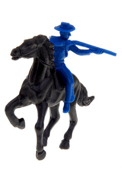 toy cowboy on horse